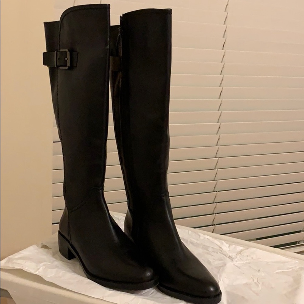 Black leather knee high boots